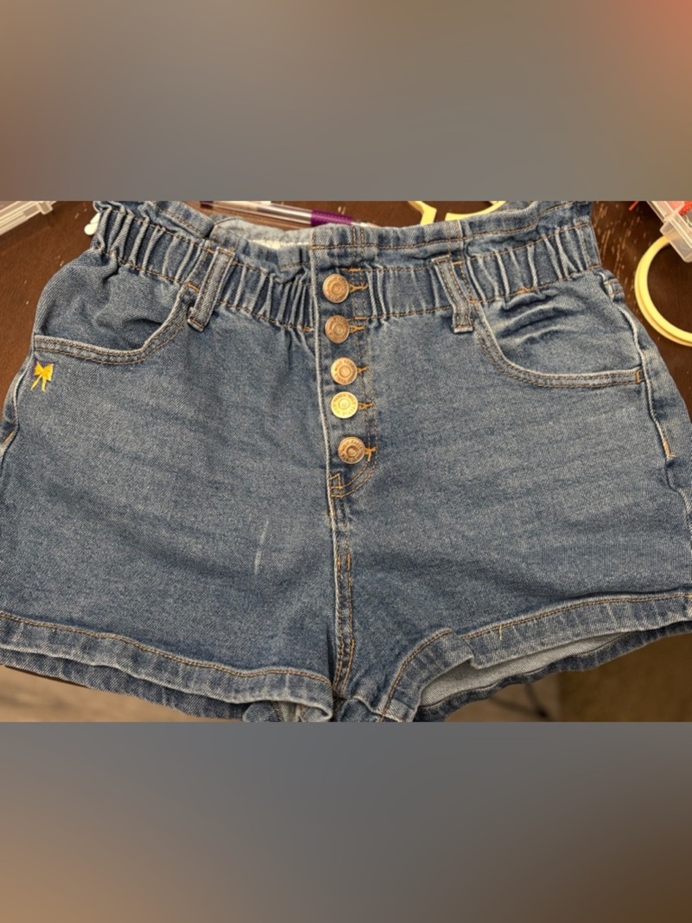 Hand embroidered bow High-Waist Blue Denim Women’s Shorts with Button Front
